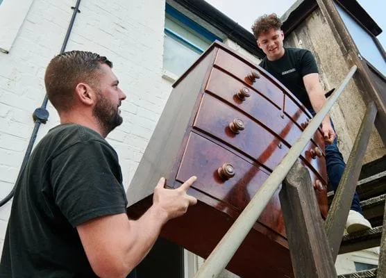 two men doing a flat clearance