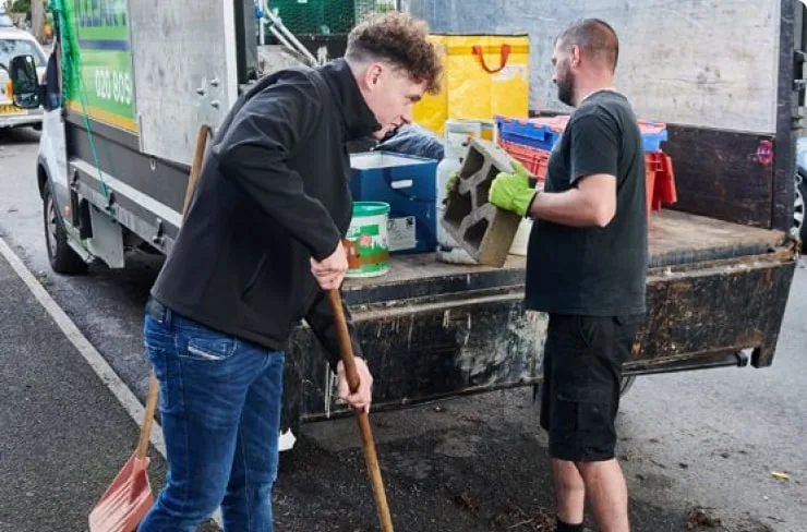 Office clearing experts tidying up the van