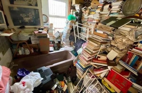 A room filled with items from a hoarder that requires a clearance