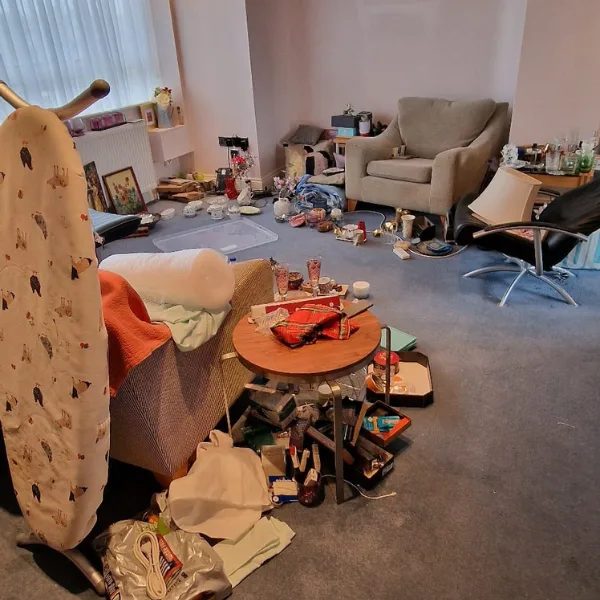 a room filled with clutter that requires a clearance service